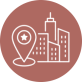 An icon depicting a city skyline with a location pin highlighting a central area.